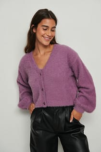 Fluffy gebreide crop sweater