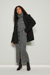 Melange-Strickrock mit Knopfdetail