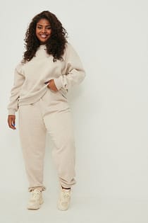 Ekologiska, avsmalnande sweatpants