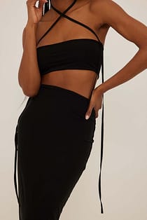 Top de malla con detalle de tiras