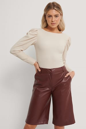 Top Met Lage Rug En Pofmouwen