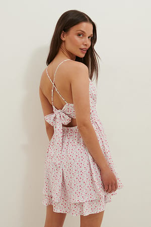 Pink Flower Print Minikjole Med Knude Bagpå