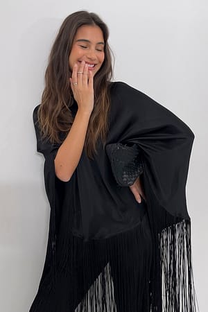 Poncho con flecos