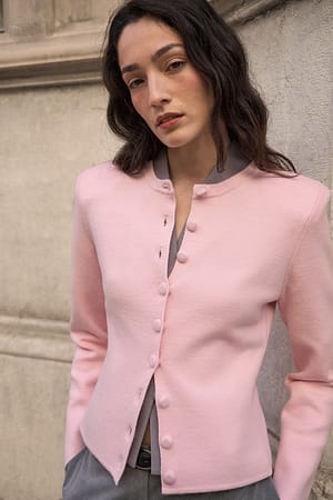Pink Strikket cardigan med skulderputer