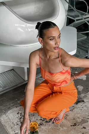 Orange Graphic Waves Lacing Back Detail Top