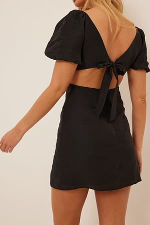 Black Robe mini nouée dans le dos