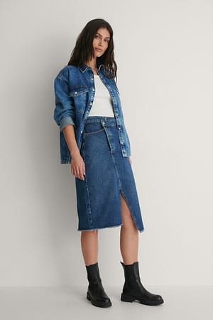 Mid Blue Ekologisk denimkjol med asymmetrisk fåll