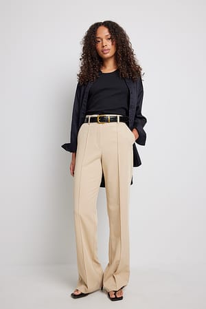 Beige Kostymbyxor med slits bak