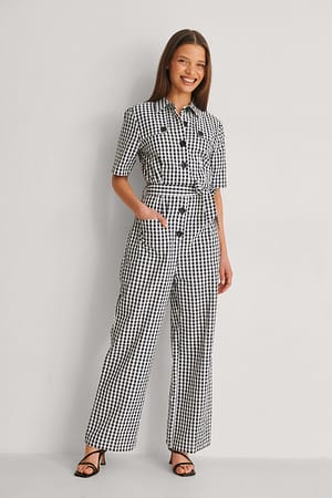 Checkered Jumpsuit mit Gürtel