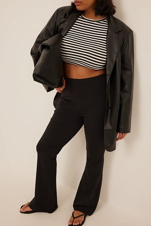 Black Leggings de talle alto acampanados orgánicos