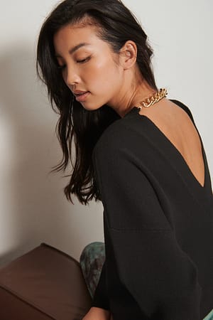 Black Genanvendt strikket sweater med kæde og åben ryg