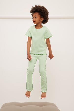 Broek met contrasterende naad