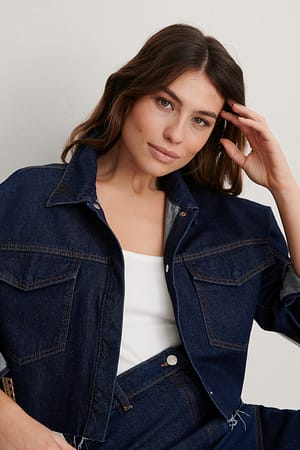 Dark Blue Organisch denim blouse met gerafelde zoom