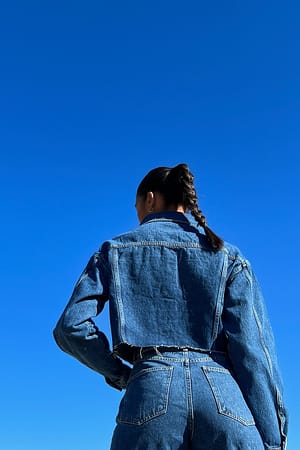 Mid Blue Cropped Raw Hem Denim Jacket