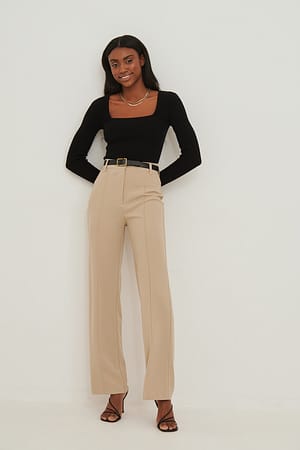 Beige Eng anliegende Anzughose mit weiten Beinen