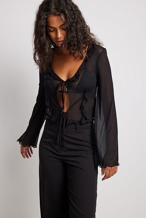 Black Mesh vest met ruches en strikdetail