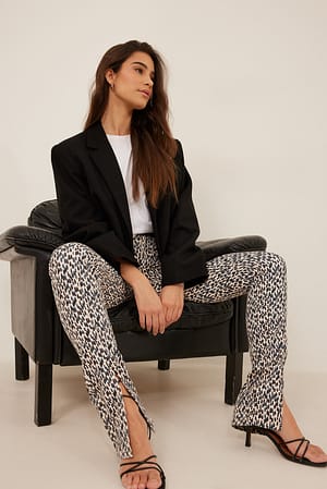 Print Skinny-Jeans mit Frontschlitz