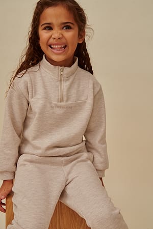 Beige Melange Mini tröja med dragkedja