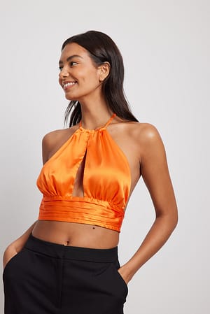 Orange Draperad topp i satin med halterneck