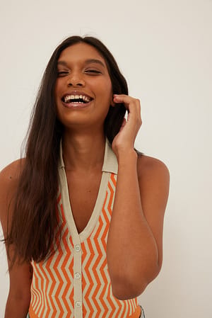 Orange Strikket top i halterneck med krave