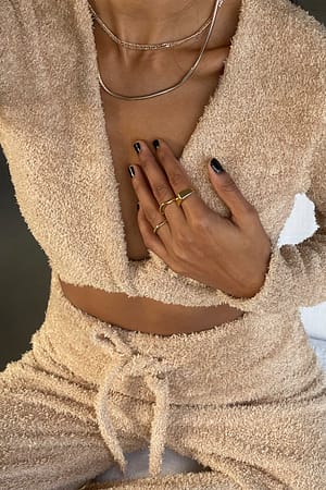 Beige Pull court cache-coeur en tricot