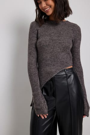 Asymmetrische top met lange mouwen