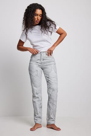 Print Denim med mellomhøyt liv og smale bein