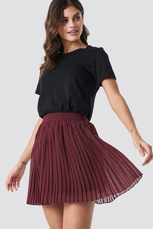 Falda mini plisada