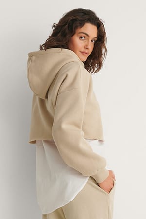 Beige Organic Hoodie mit grobem Saum