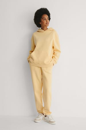 Light Yellow Ekologiska, avsmalnande sweatpants