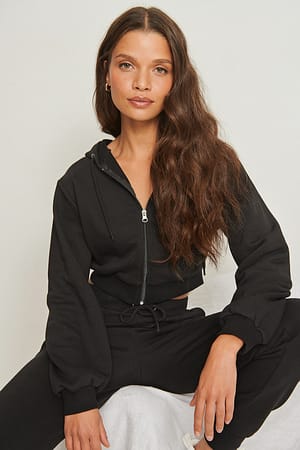 Black Sudadera orgánica con detalle en la cremallera