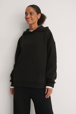 Oversize hoodie med ficka