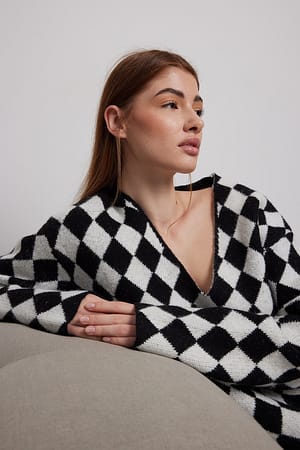 Checked Gestrickter übergroßer V-Ausschnitt-Pullover