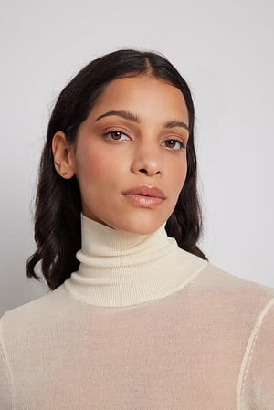 Offwhite Strikket pologenser
