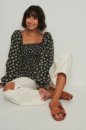 Daisy Orgánico top estampado smocked de algodón