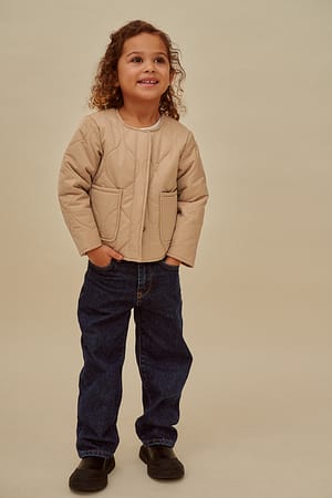 Beige Mini gequilte jack