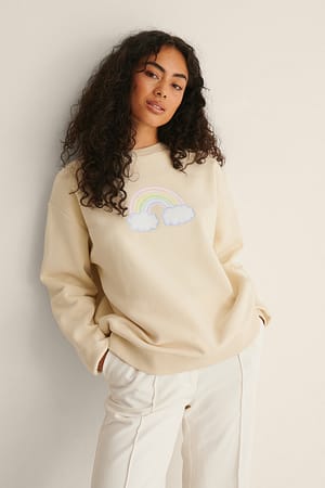 Sweatshirt imprimé arc-en-ciel