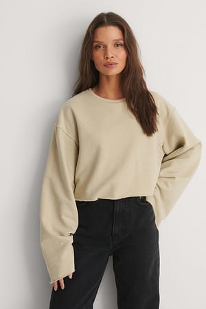 Beige Sweat à manches larges à bord brut biologique