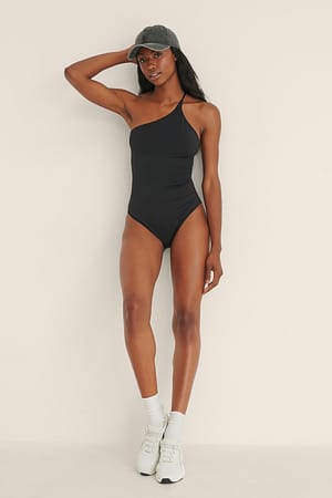 Black Gerecyclede asymmetrische badpak met dunne bandjes