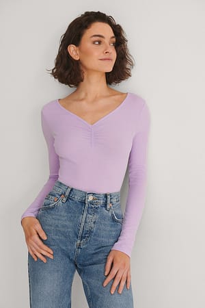 Purple Recycled ribbstickad topp med rysch
