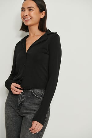 Black Skinnende top med kravedetalje