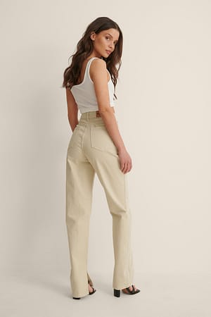 Beige Organische seitlich geschlitzte Jeans