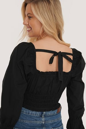Black Ekologisk blus med fyrkantig ringning och knyt bak