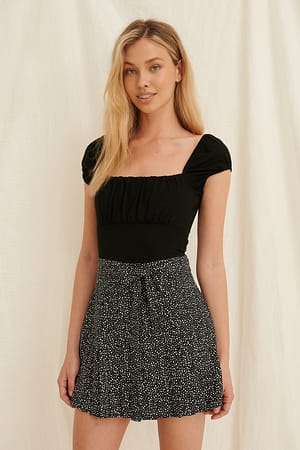 Black Top con volantes reciclado