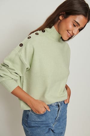 Sweater met knoopdetail
