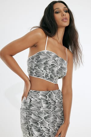 Black Zebra Cropped Pailletten-Top mit bedrucktem Detail