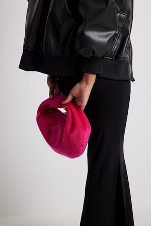 Strong Pink Bolso redondo de pelo sintético