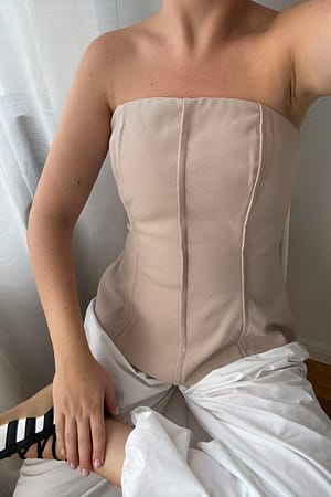 Taupe Zandloper top met naaddetail