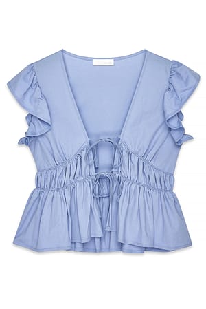 Light Blue Topp med volanger og skuldre