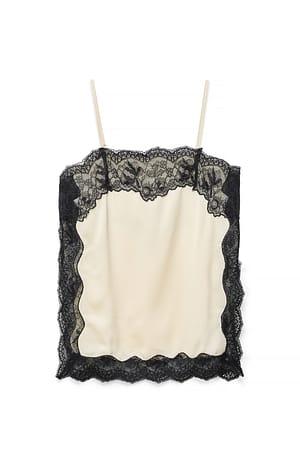 Cream Blondesinglet med slidsdetalje